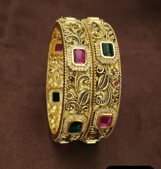 Amazing floral design pink & green stones bangles.